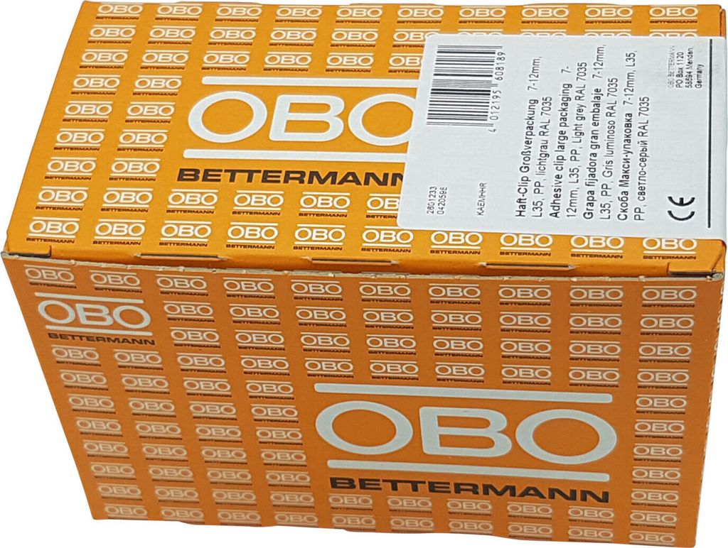 A cardboard box with the brand name 'OBO BETTERMANN' printed repeatedly on its sides. A label with product information and a barcode is attached to the top right corner.