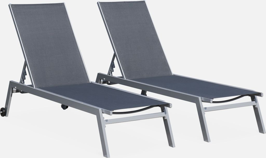 Two gray lounge chairs are shown against a white background.