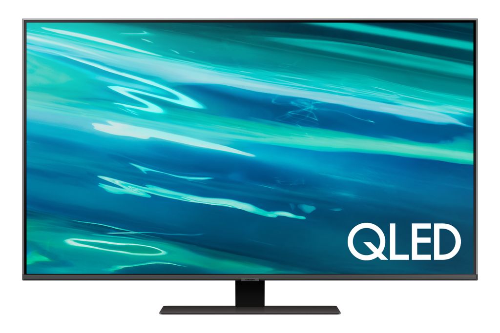 A Samsung QLED television with a colorful abstract image on its screen, placed on a stand.