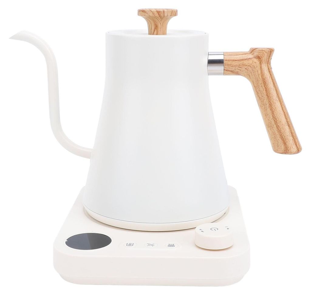A white electric gooseneck kettle with a wooden handle and lid sits on its charging base.