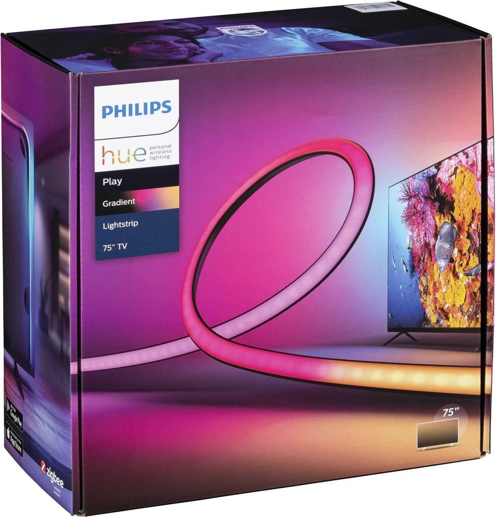 The image shows the packaging for a Philips Hue Play Gradient LED Lightstrip for a 75-inch TV. The packaging features a gradient of purple, pink, and orange colors, with an image of the lightstrip itself and a television screen displaying colorful content.