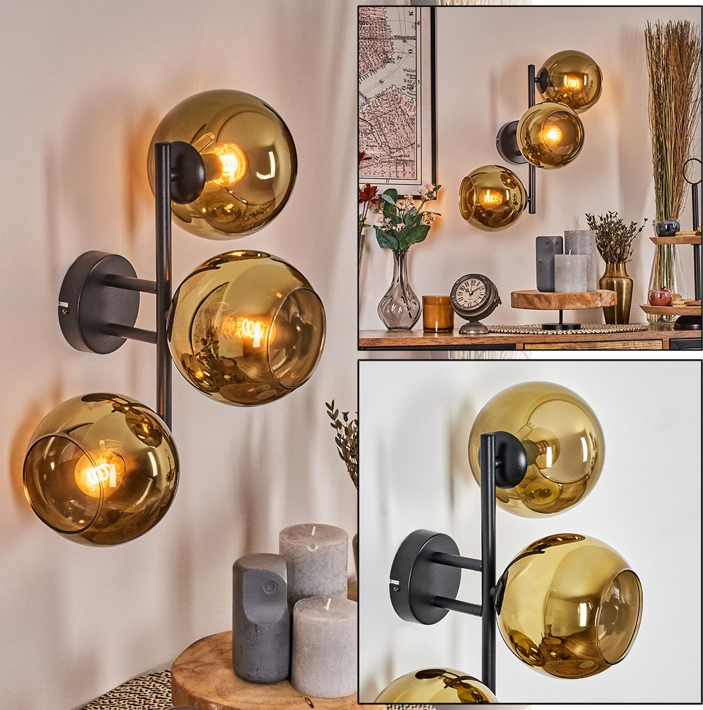 Cesaro Wandlampe aus Metall/Glas in Schwarz/Goldfarben