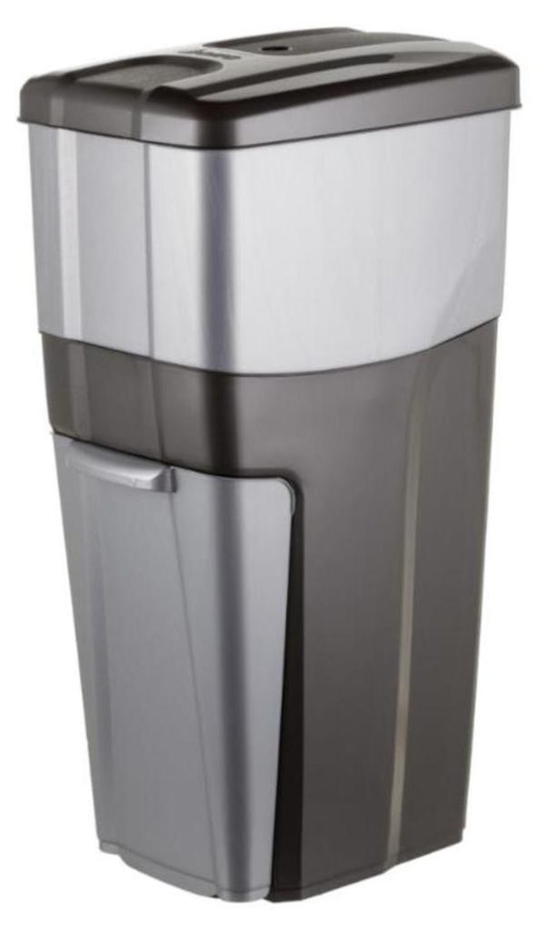 A tall, rectangular trash can with a lid and a front-opening compartment.