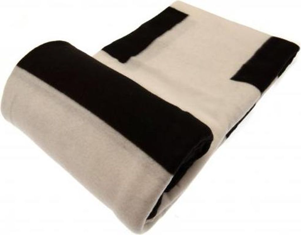 A rolled-up blanket with black and white stripes.