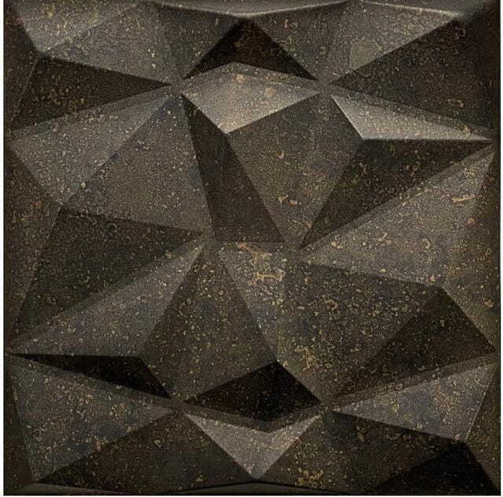 A close-up, angled view of a textured, geometric wall panel.