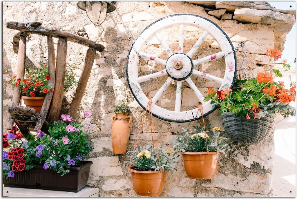 Wallario Outdoor-Poster für Garten oder Balkon, Motiv Wagenrad an Natursteinwand, in ca. 61 x 91,50 cm