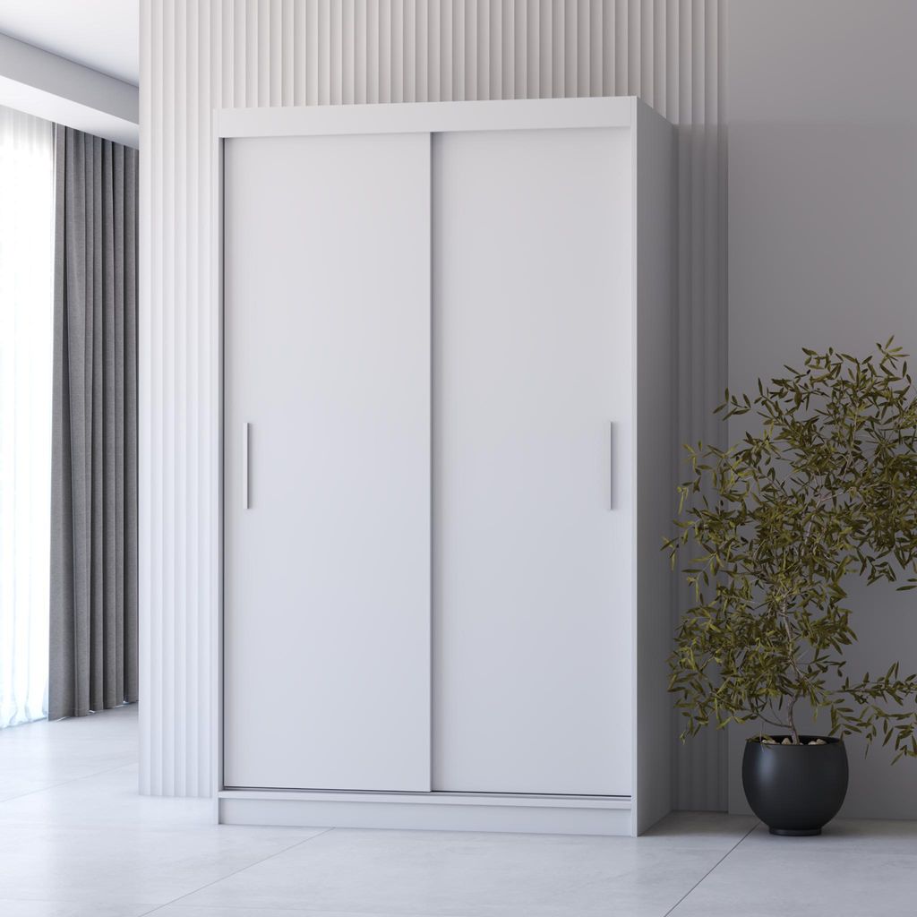 A modern white sliding door wardrobe is shown in a room with a plant.
