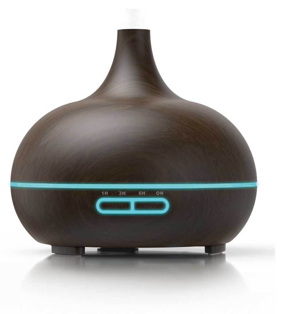 A dark brown aroma diffuser with a wood grain finish, emitting a visible mist from the top. It has a blue LED light strip around its base with illuminated buttons.