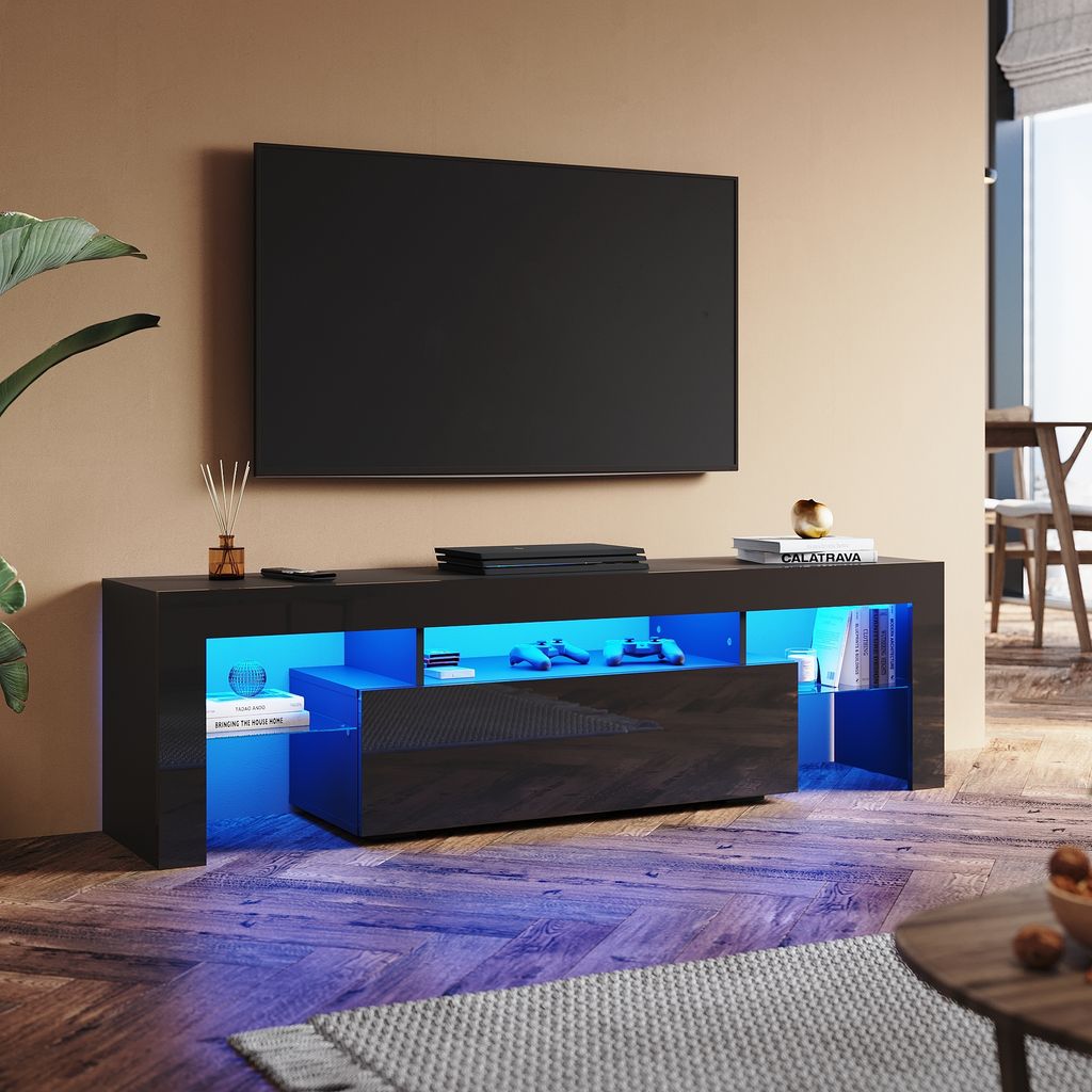 A modern living room with a TV stand and a TV.