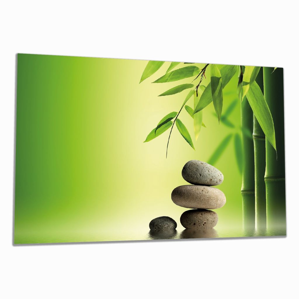 Wallario Herdabdeckplatte aus Glas, Größe 80 x 52 cm 1-teilig, Motiv Steinstapel im Grünen
