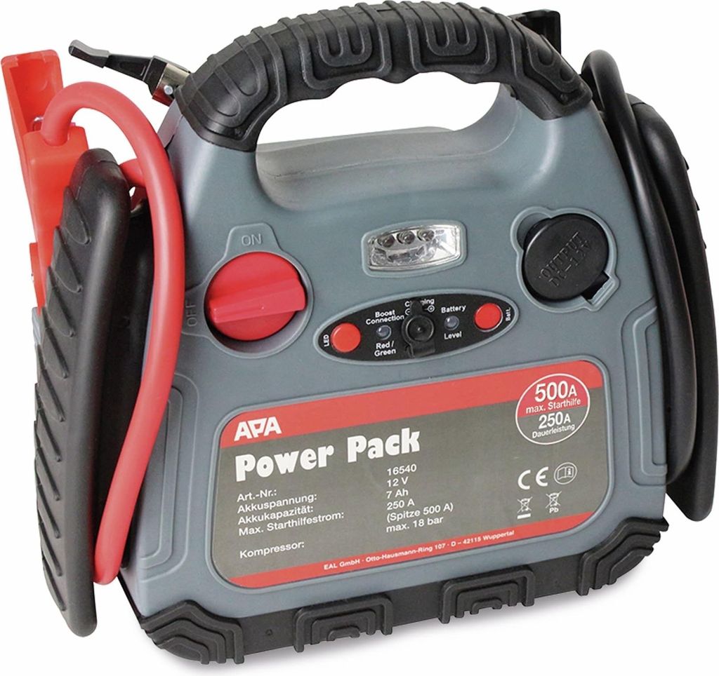 A gray and black jump starter power pack with red jumper cables attached.