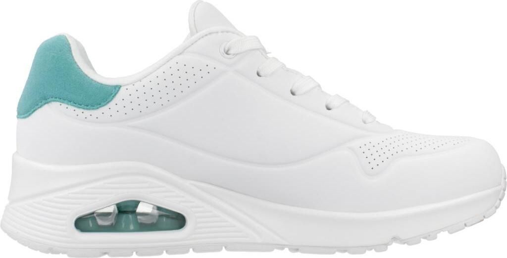 A side view of a white sneaker with teal accents on the heel.