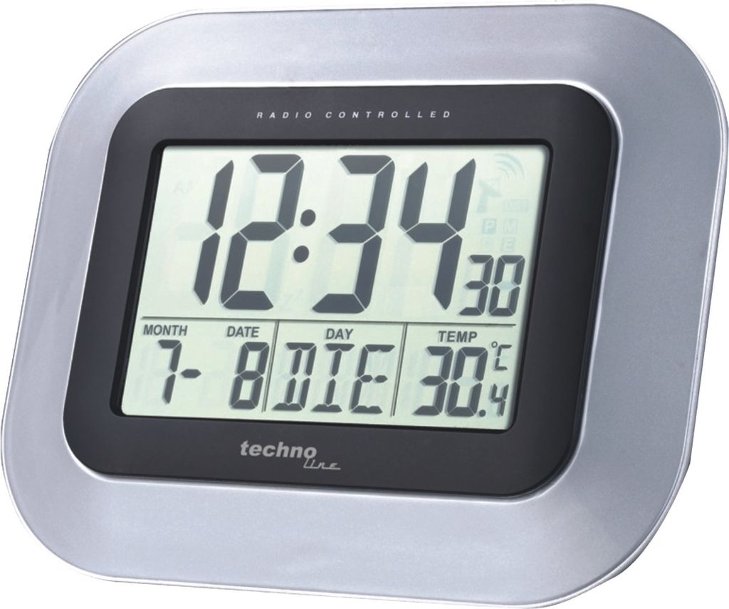 A digital wall clock displaying the time, date, and temperature.