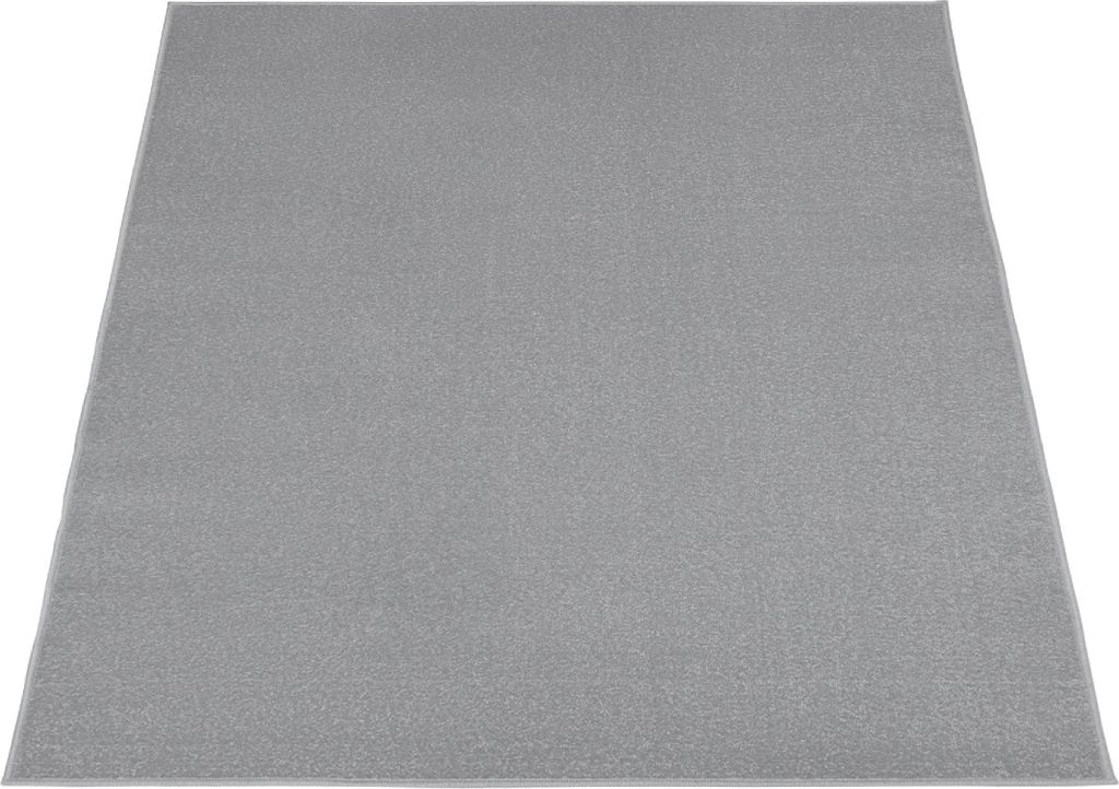 A gray rug is shown from a slightly elevated angle against a white background.