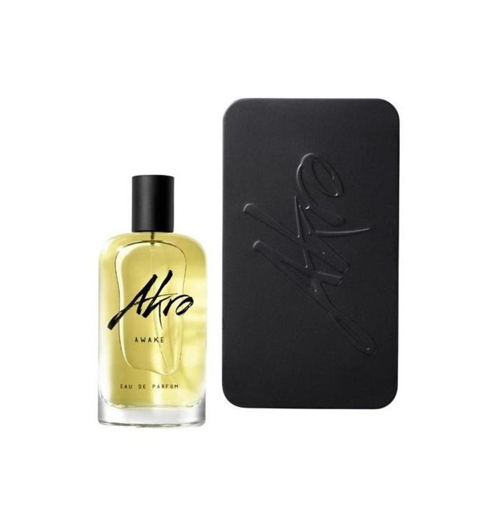 A bottle of perfume and its packaging are shown against a white background.