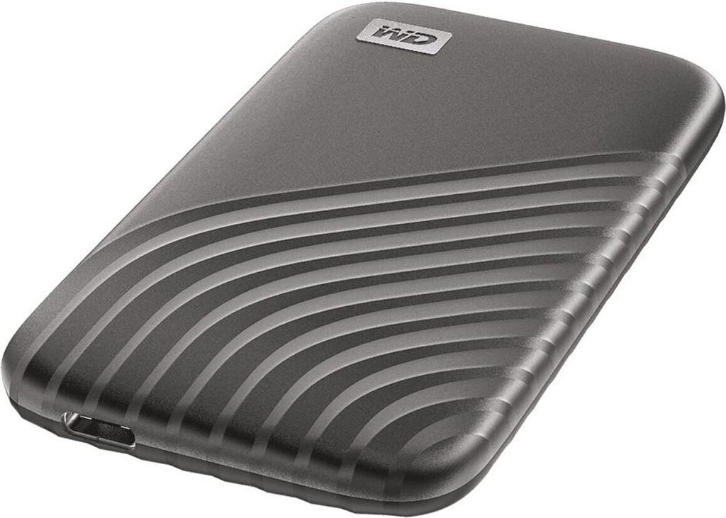 A dark grey external SSD hard drive with a textured surface and a USB port.