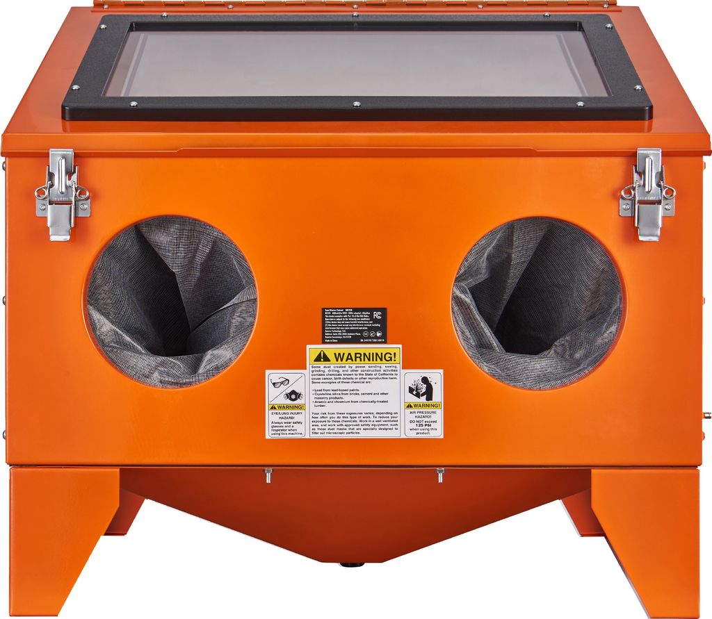An orange sandblasting cabinet with a clear top window and two glove openings on the front.
