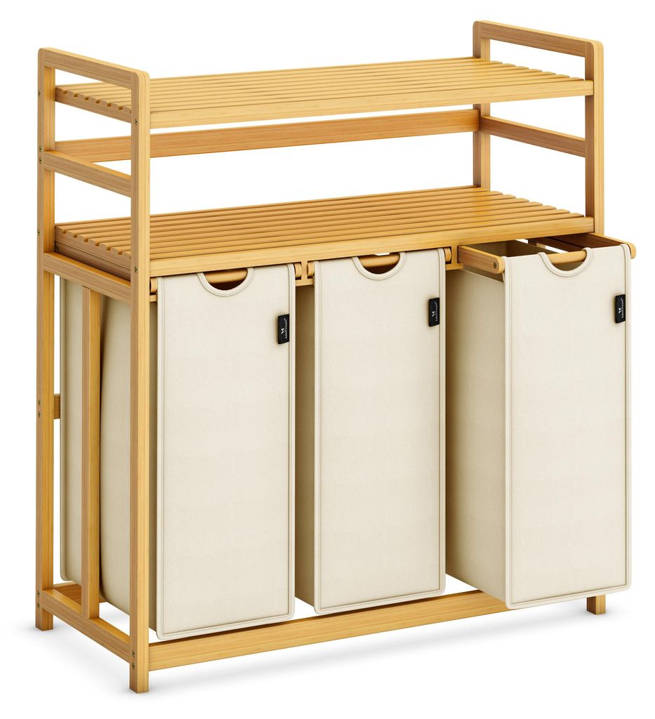 A three-compartment laundry hamper with two shelves, made of bamboo and beige fabric.