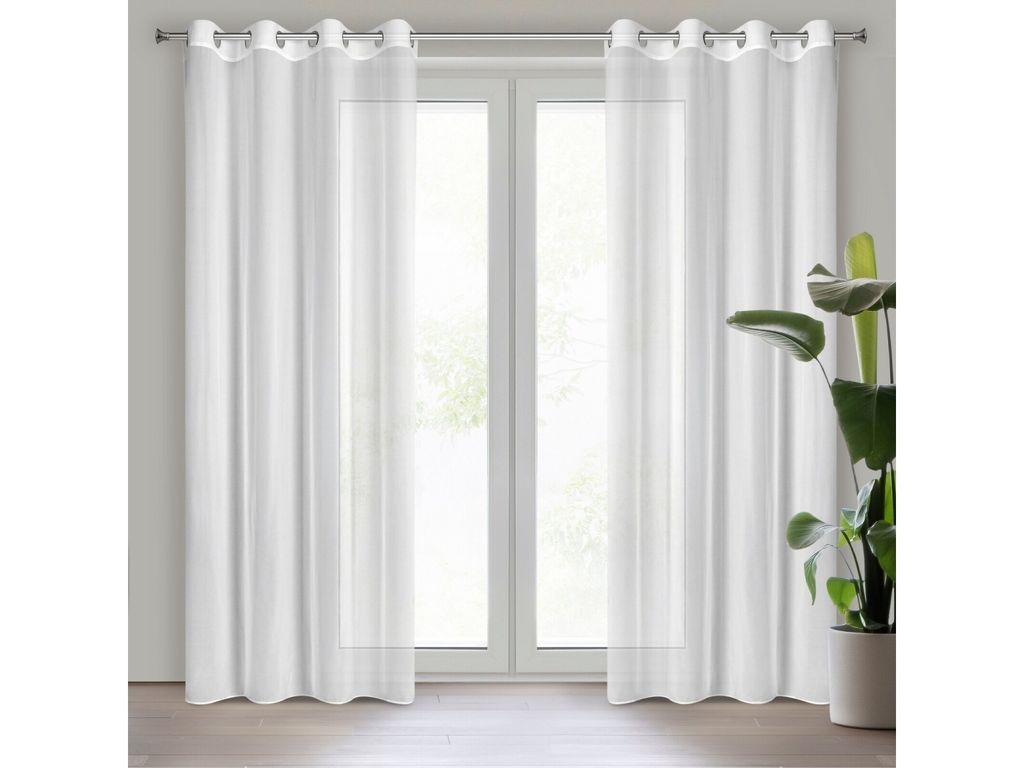 Two white sheer curtains hanging on a window.