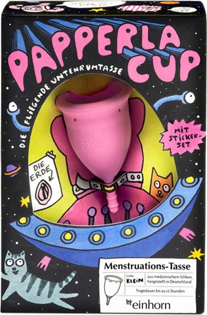 The image shows the packaging of a pink menstrual cup with a space-themed illustration.