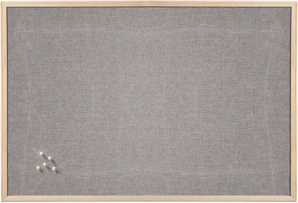 A bulletin board with a gray fabric surface and a light wood frame.