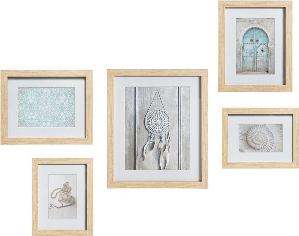 A collection of five framed pictures arranged on a white background.