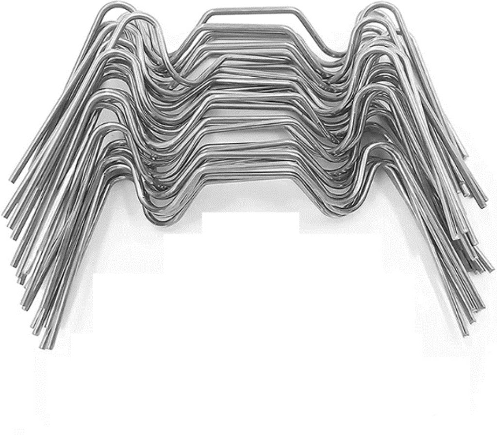 A stack of metal clips for greenhouse glass.