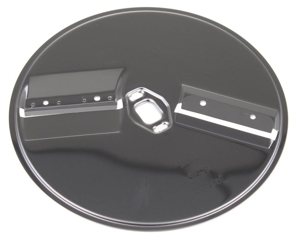 A close-up, top-down view of a food processor cutting disc.