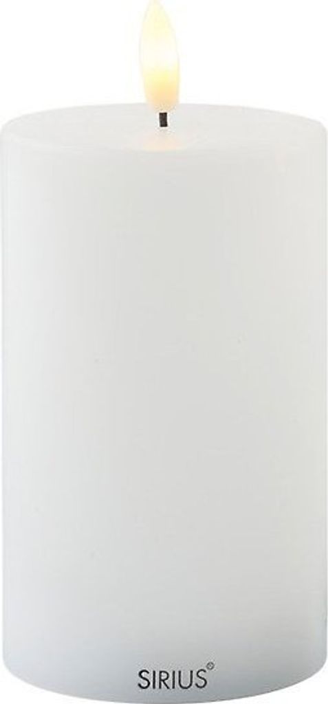 A white LED candle with a flame.