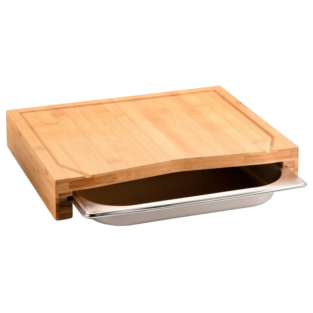 A bamboo cutting board with a stainless steel tray underneath.
