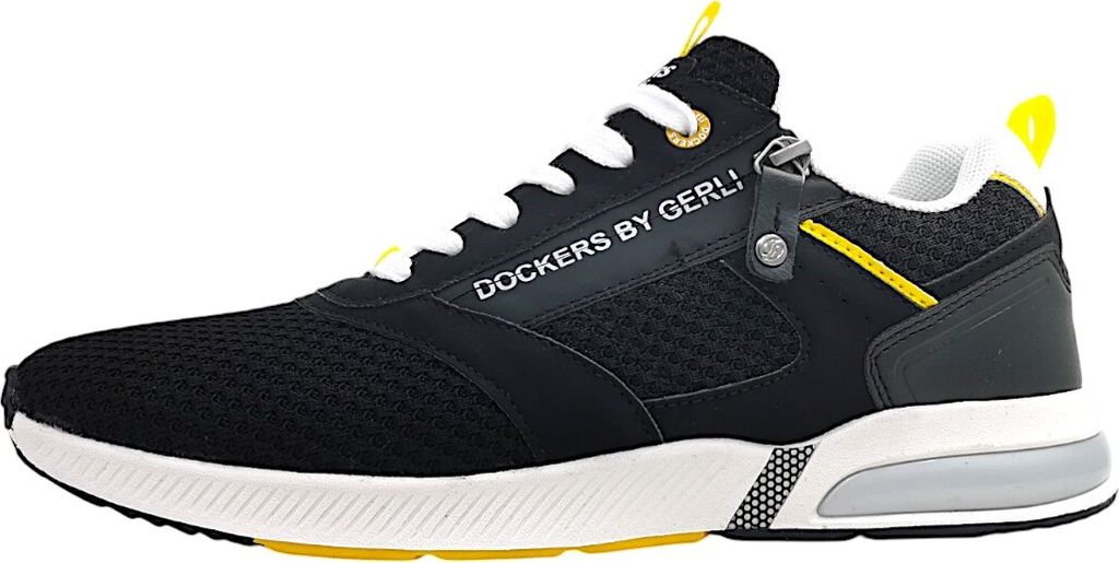 A side view of a black sneaker with white laces and yellow accents.