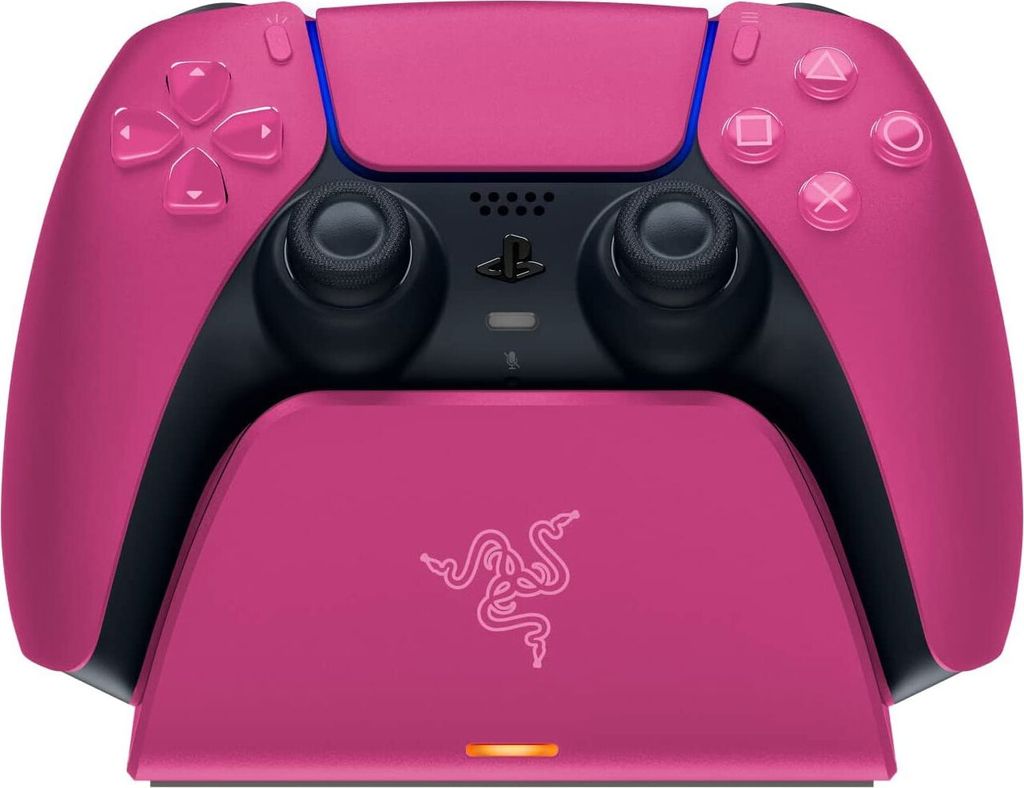 A pink PlayStation 5 controller and its charging dock are shown against a white background.