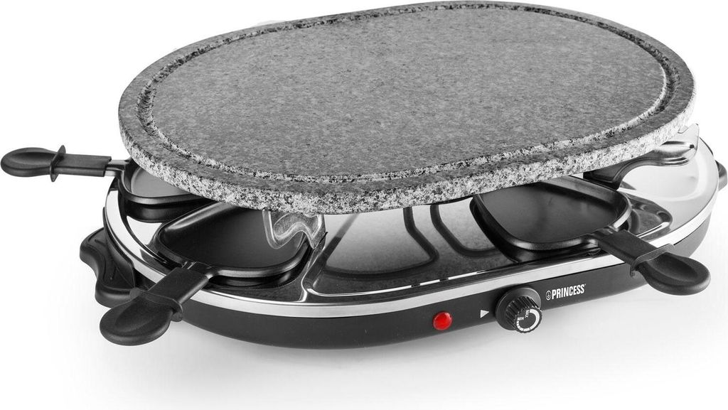 A raclette grill with a stone top is shown against a white background.