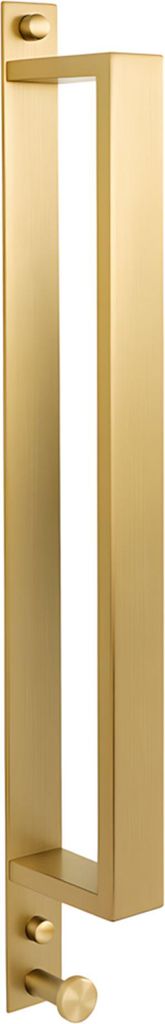 A close-up view of a gold-colored towel holder.
