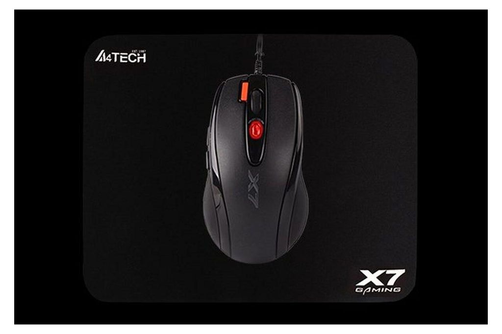 A black gaming mouse on a black mousepad.