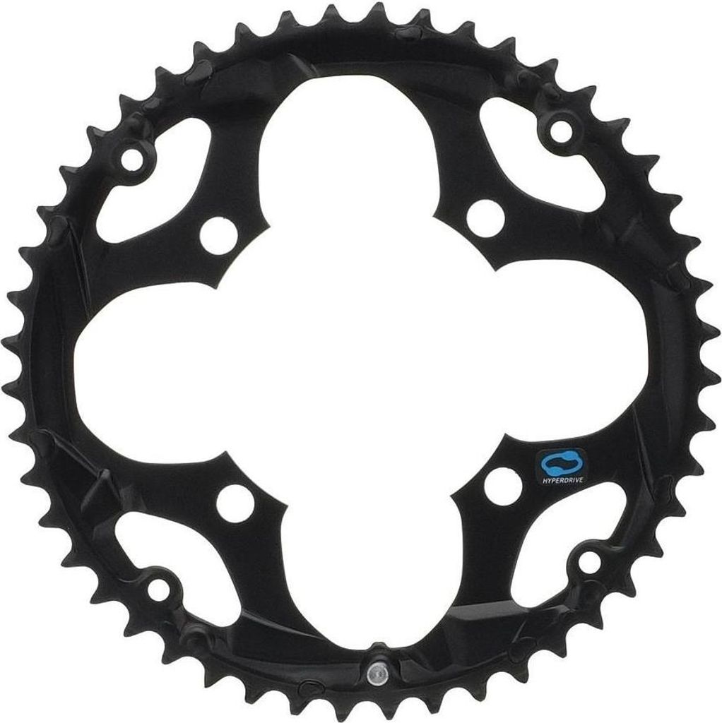 A black bicycle chainring with a decorative cut-out design.