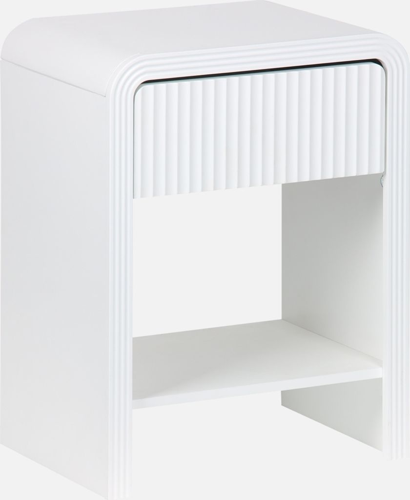 A white nightstand with a fluted drawer front and an open shelf.