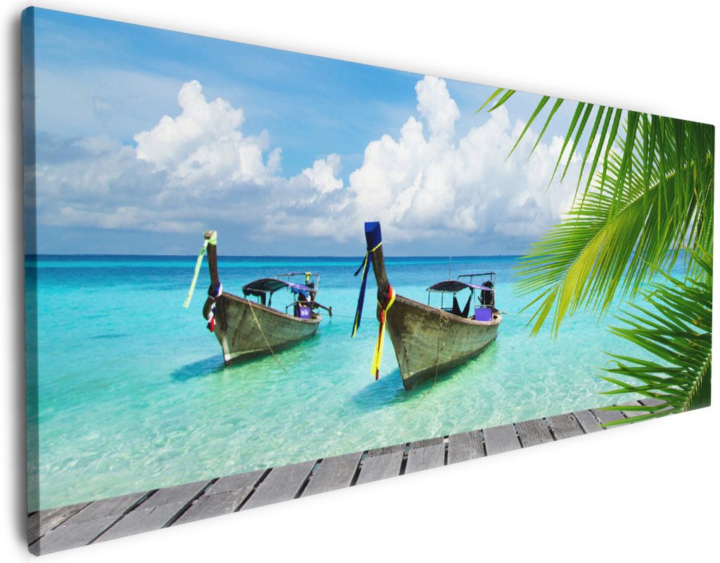 Wallario Premium Leinwandbild Sonnenboot in der Karibik in Größe 60 x 150 cm