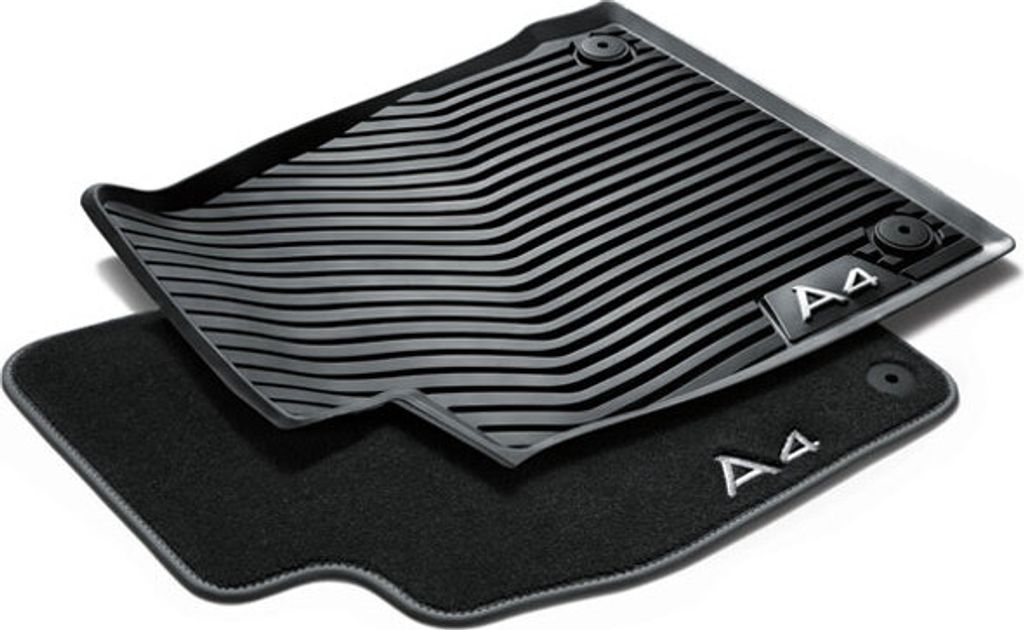 A set of car floor mats, one rubber and one carpet, are shown against a white background.