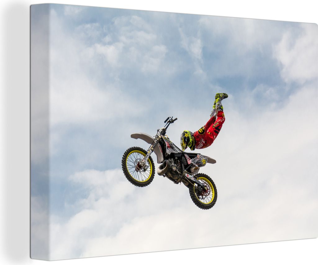 OneMillionCanvasses - Leinwandbilder - 140x90 cm, Motorrad und Motorradfahrer bei einem Stunt in der Luft, Wandbilder Kunstdruck Wanddekoration