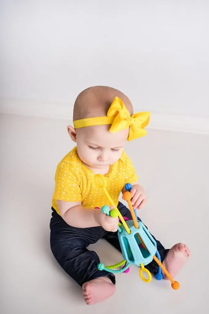 Jouet sensoriel Zippee pour le réflexe de préhension de bébé - 5