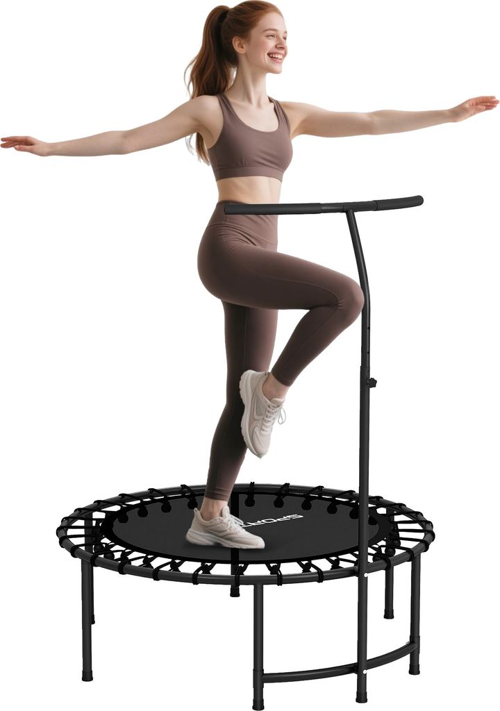 A woman is exercising on a mini trampoline with a handle.