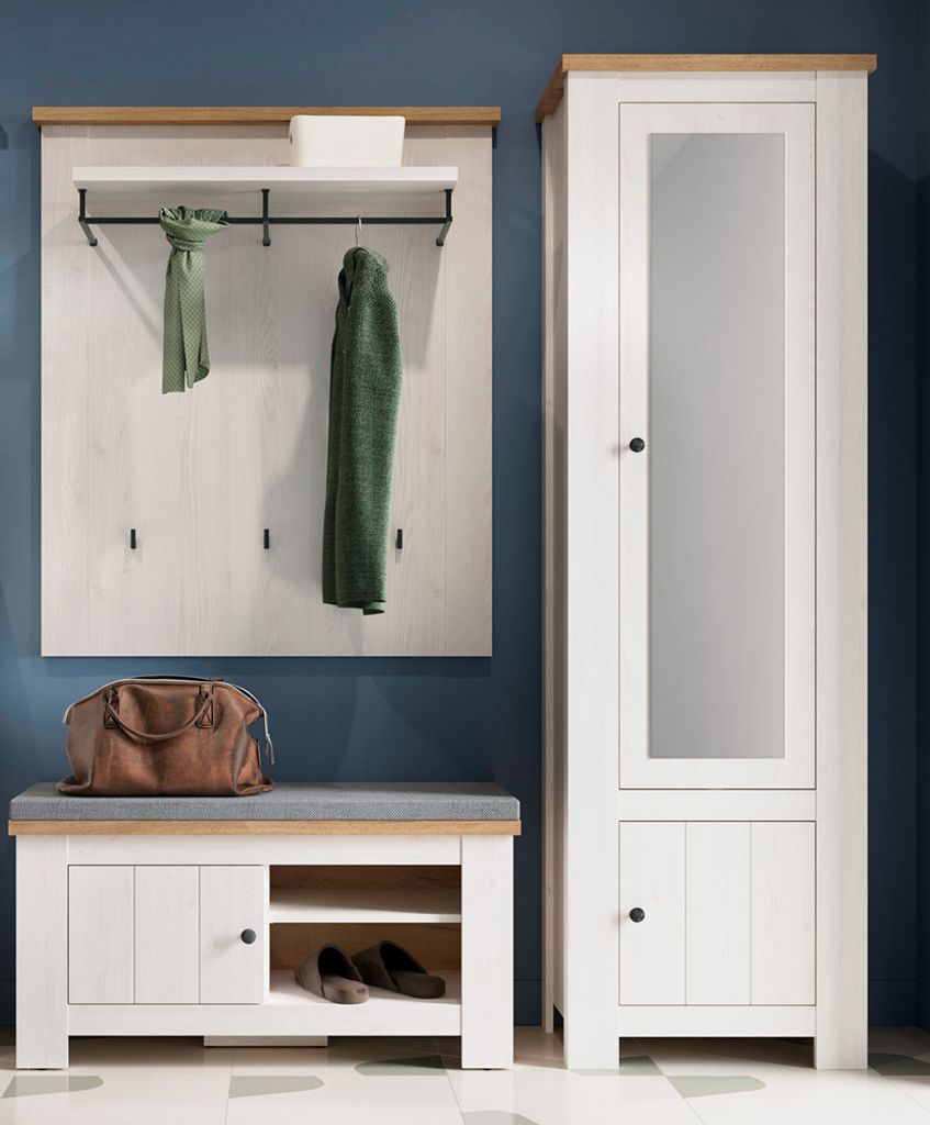 A hallway set including a coat rack, bench with storage, and a tall cabinet with a mirror, set against a blue wall.