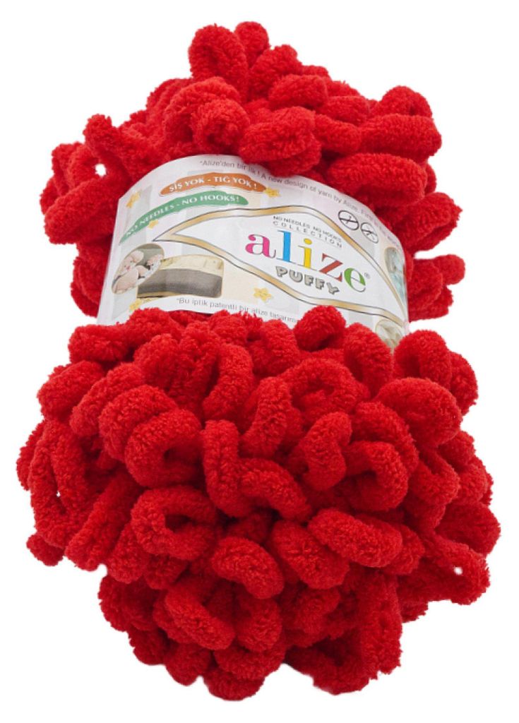 A ball of red fluffy yarn with a label.