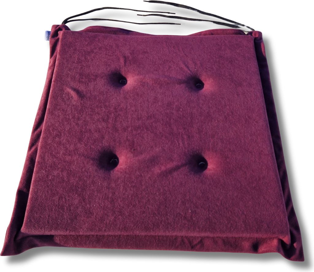 A square purple seat cushion with four tufted buttons is shown from a slightly elevated angle against a white background.