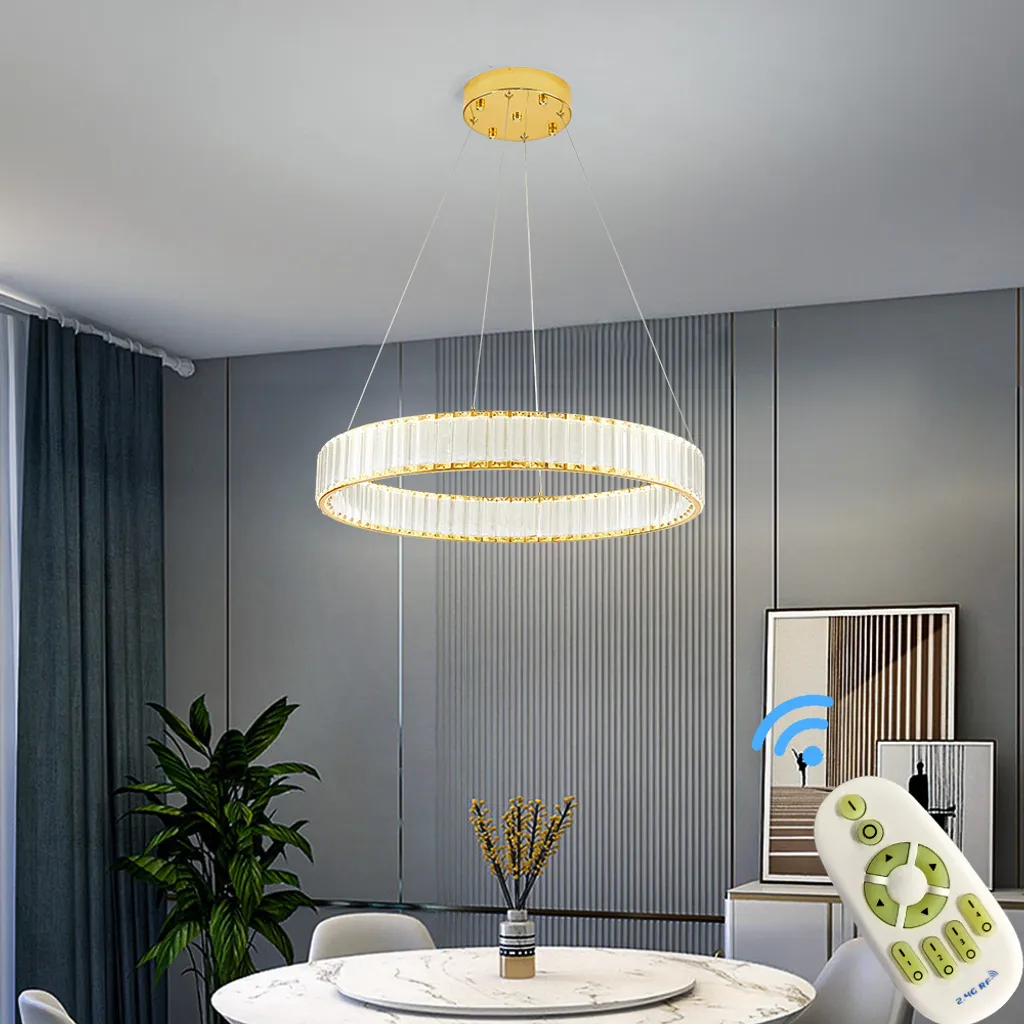Eurotondisplay Lampada a sospensione LED 3015-600 large crystal clear con telecomando Colore della luce bianco caldo, bianco neutro o bianco freddo Regolabile in continuo Dimmerabile Struttura in metallo dorato Altezza regolabile 120 cm