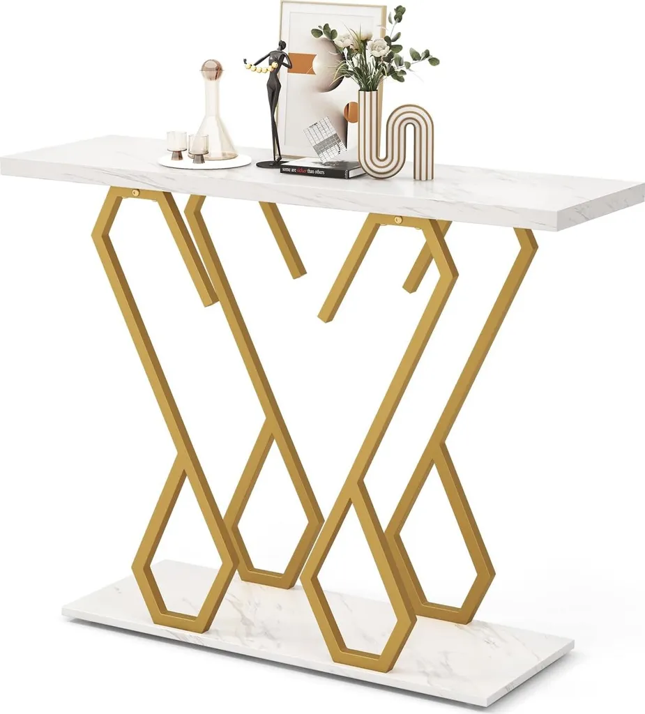 Console design marbre et or avec piètement métallique forme papillon