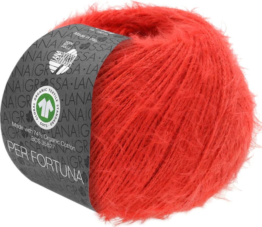 A ball of red yarn with a label wrapped around it, shown against a white background.