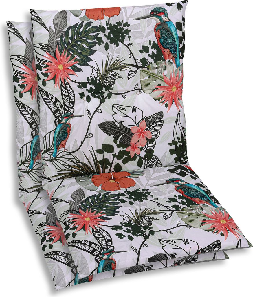 Two chair cushions with a tropical bird and flower pattern are stacked on top of each other.
