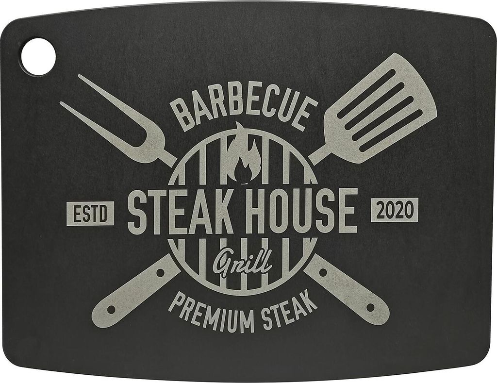 A black cutting board with a steakhouse-themed graphic.